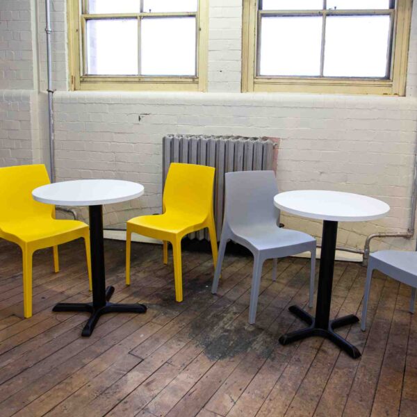 Tuff Top White 600 Round Table Tops On A Phoenix Base With Strata Yellow And Grey Side Chairs