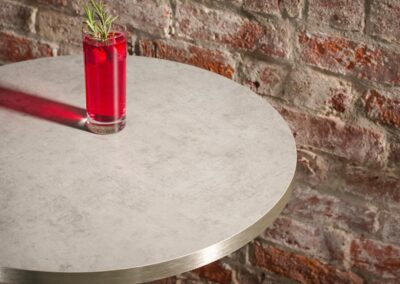 600mm Diameter Grey Chicago 25mm Thick Laminate Top With Champagne Metallic ABS Edging
