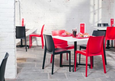 Strata Anthracite Side Chair And Strata Red Side Chair With Madrid Flip Top Dining Height Table Base And 800 Square White Werzalit Table Top 1
